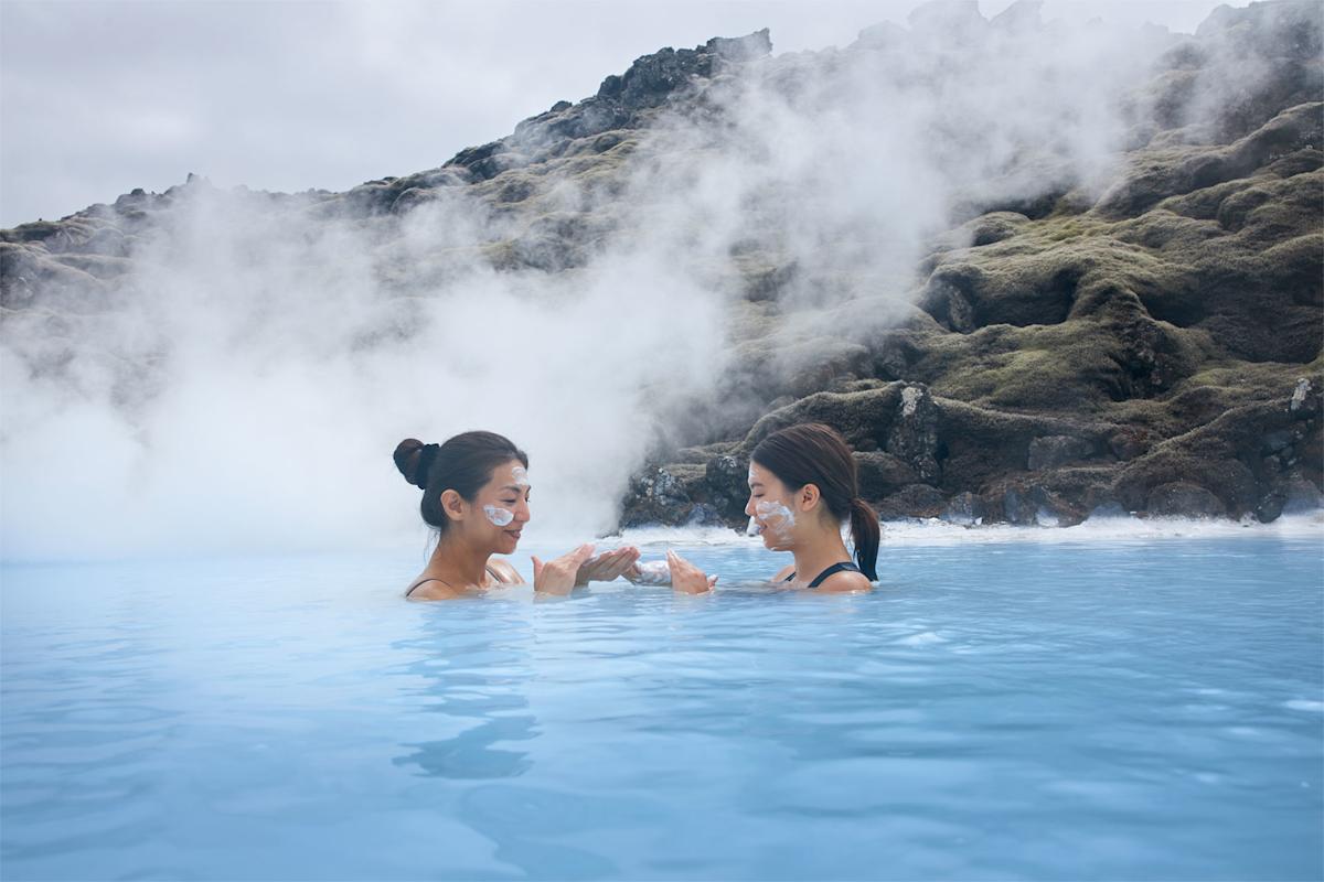 Blue Lagoon Iceland with milky-blue geothermal water surrounded by black lava fields