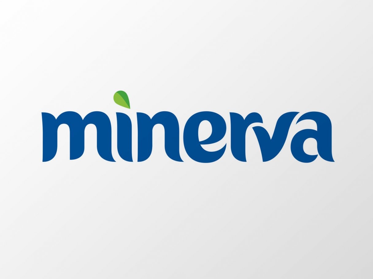 Rustic cabin in a golden field at sunset