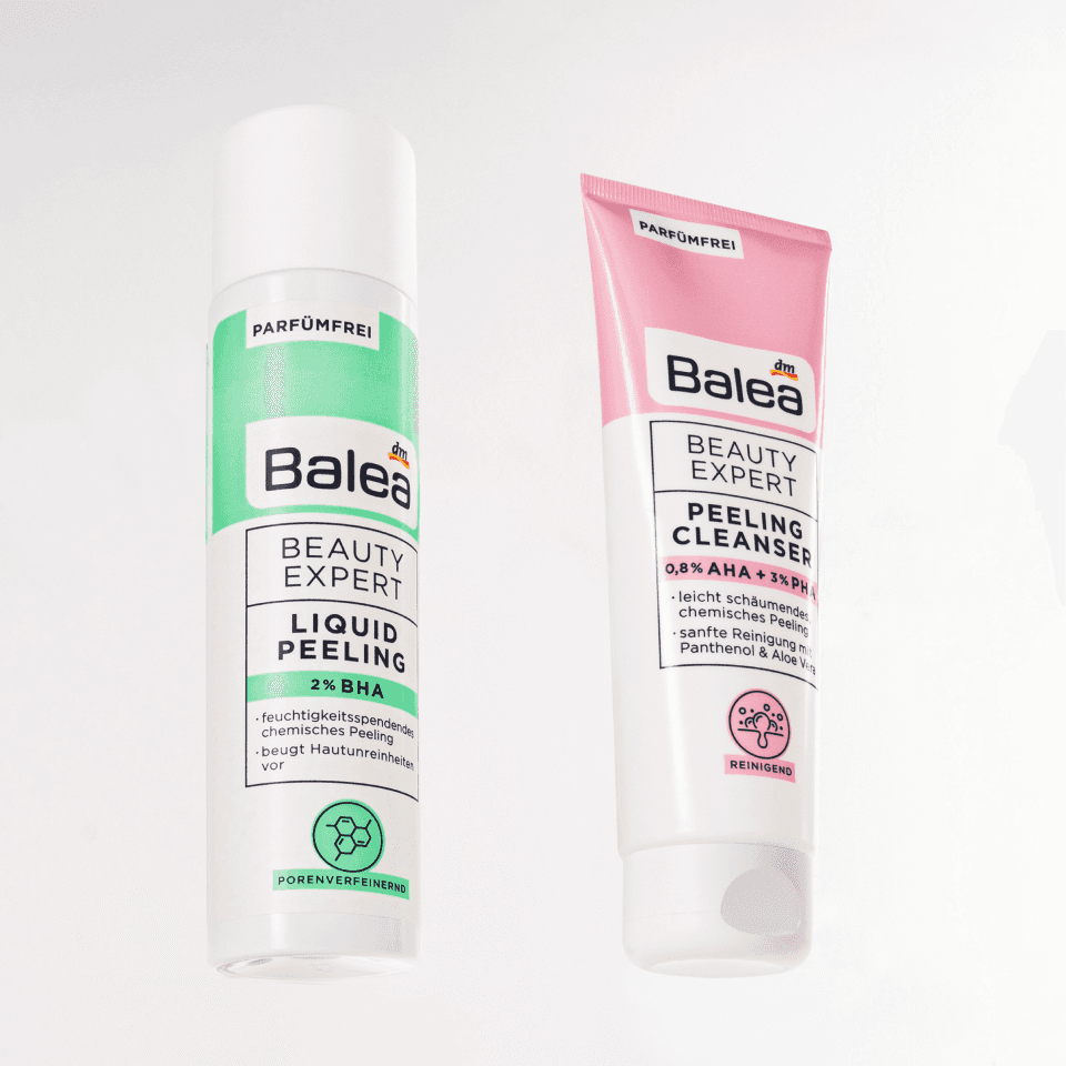 Balea Beauty Expert Detailansicht – „Liquid Peeling" (2% BHA, grüner Akzent) neben „Peeling Cleanser" (0,8% AHA + 3% PHA, rosa Akzent), beide parfümfrei.