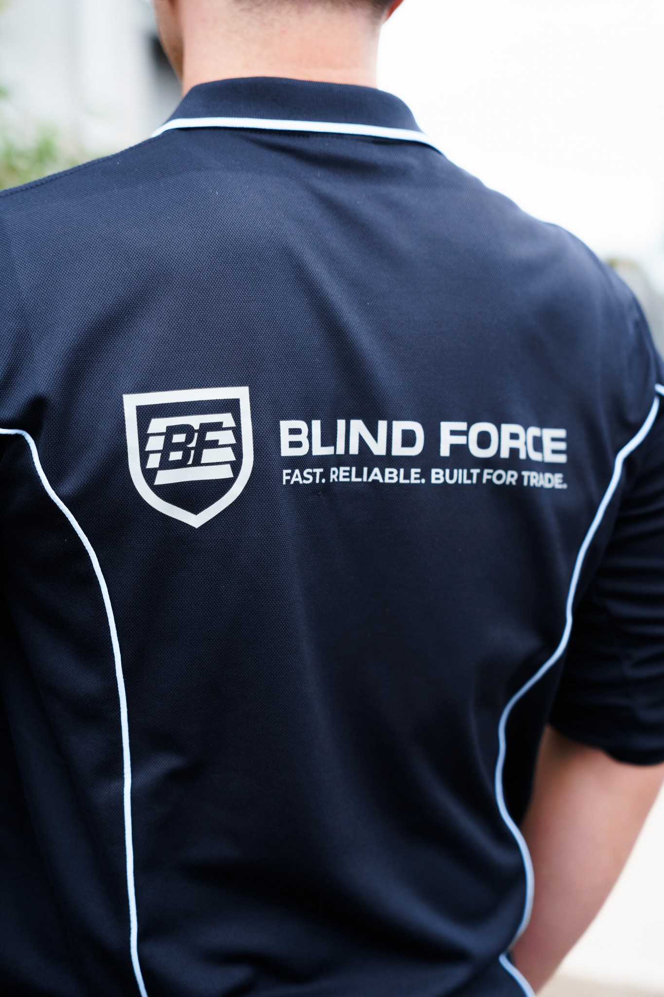 Technician uniform with Blind Force logo on back