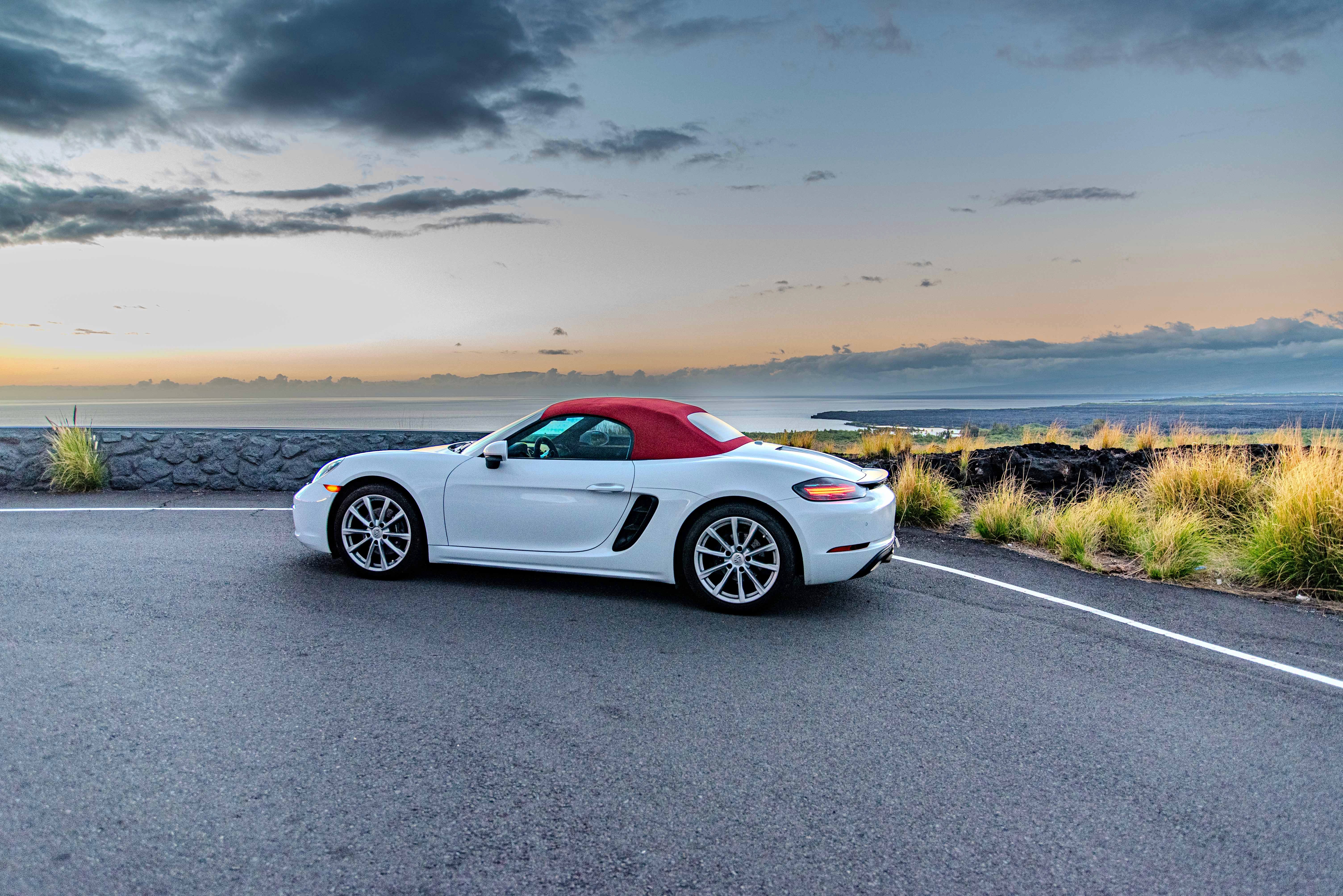 White Porsche Boxster Under Sunset Hawaii Big Island For Rent