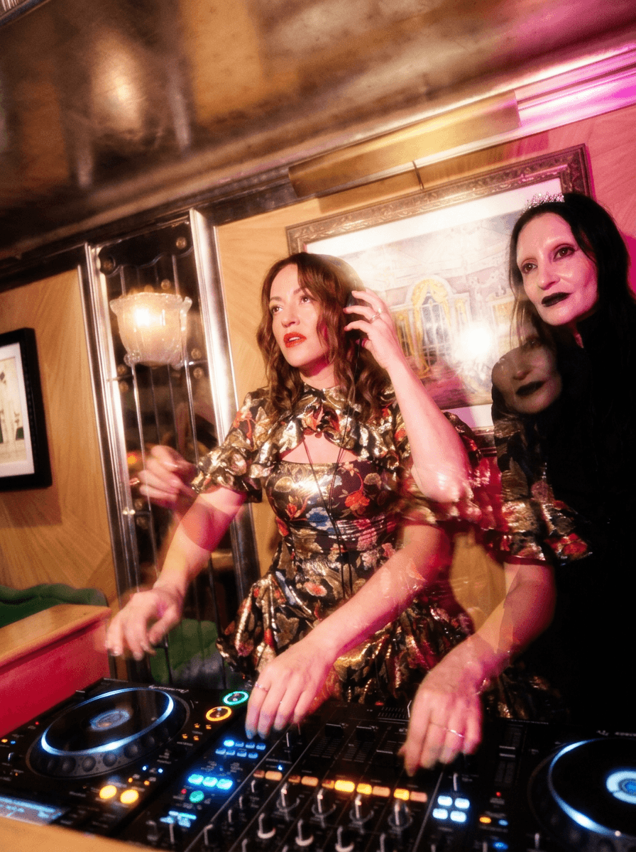 Couple embracing on street, bride's face obscured