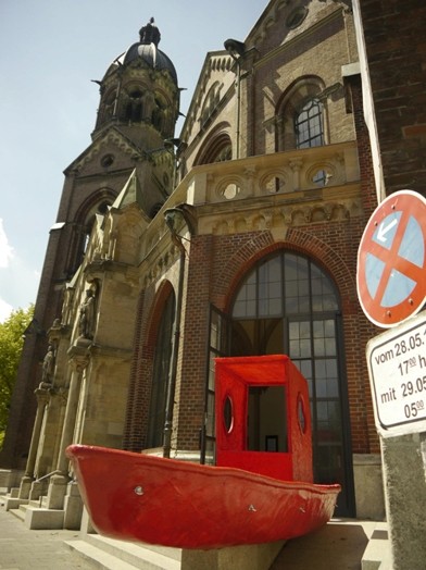 Building with a red boat
