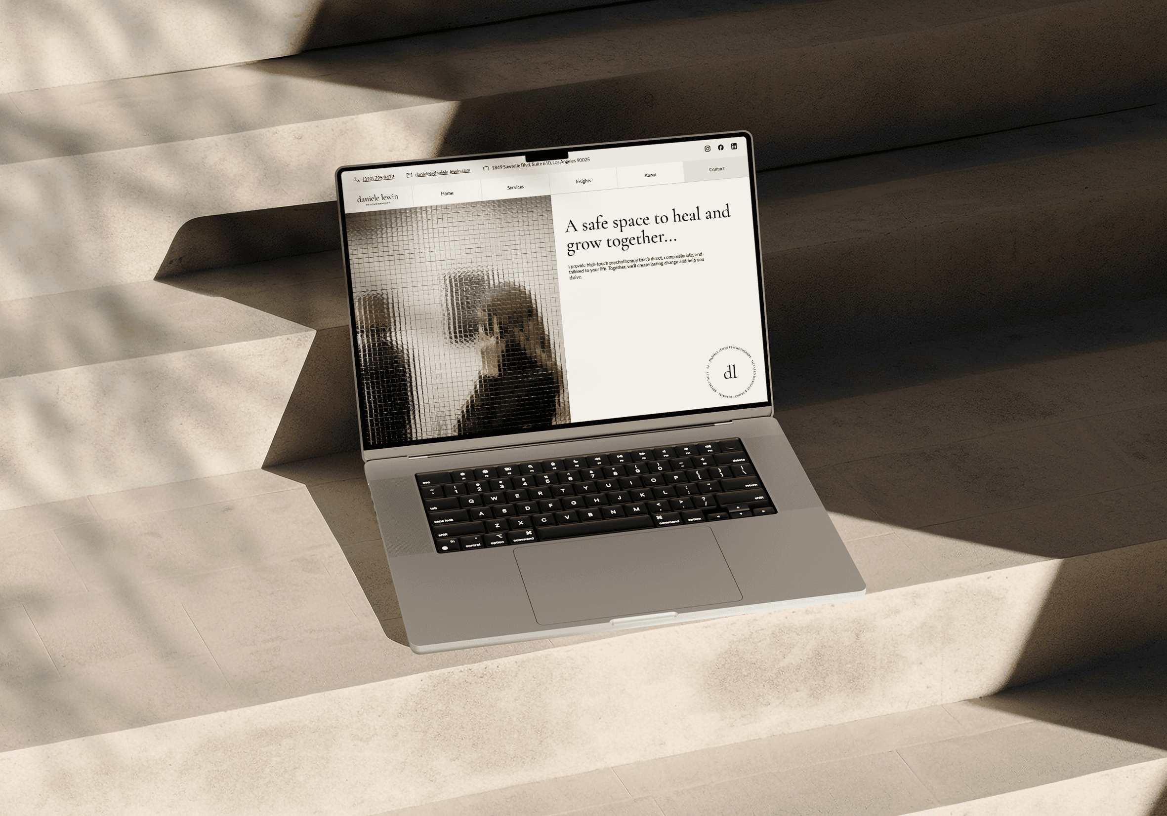 Daniele's new website opened in a laptop on t