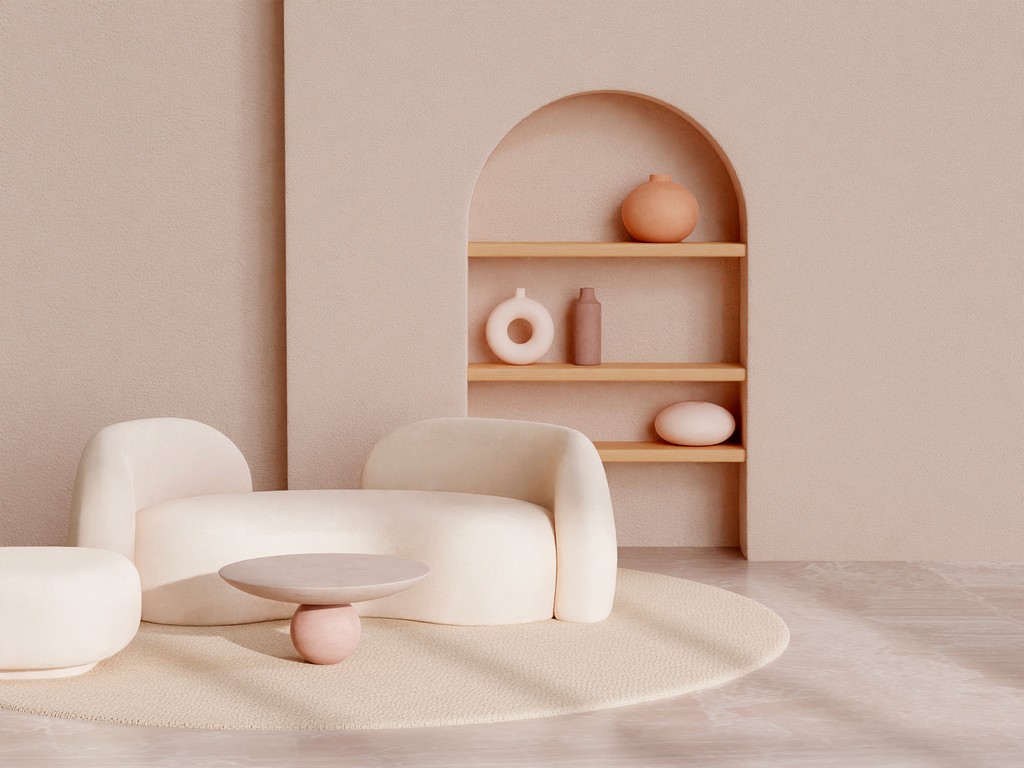 Beige room with curved sofa, round table, and arched shelves