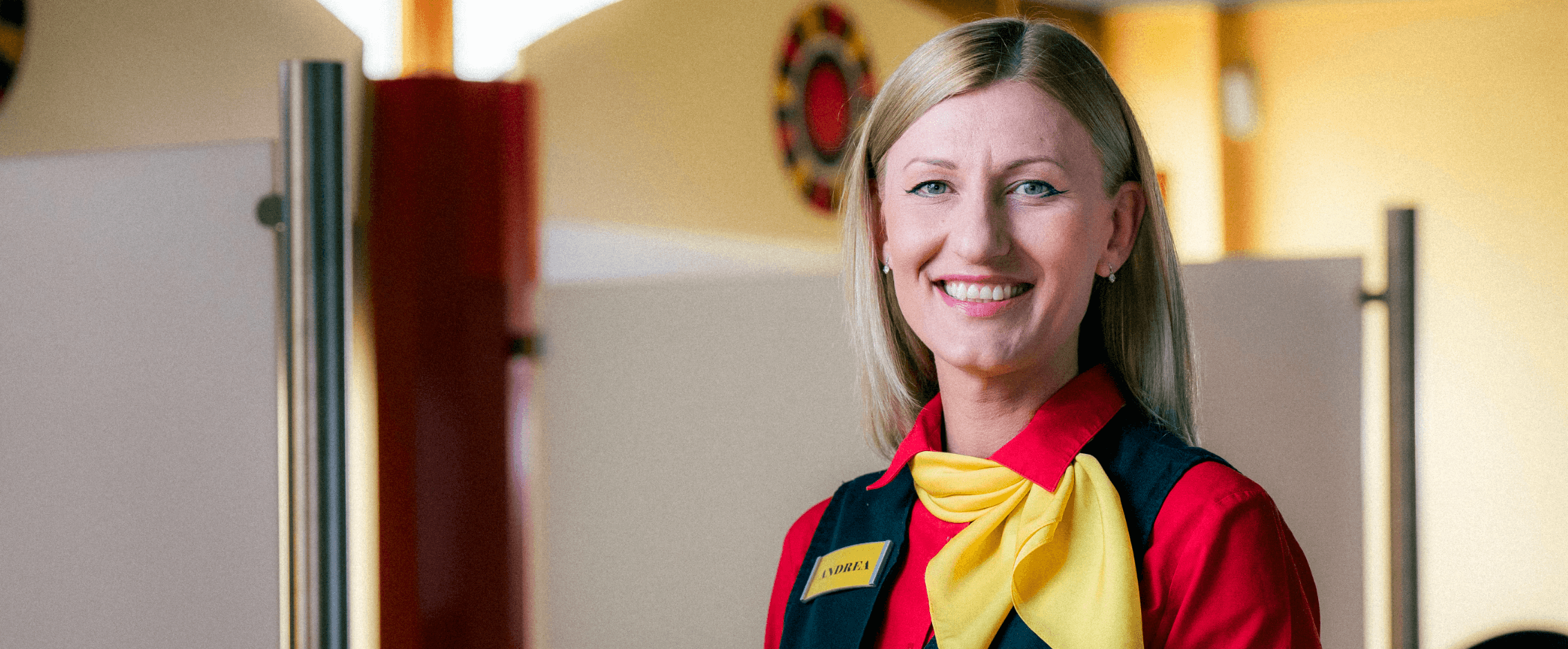 Barista in cafe pouring coffee
