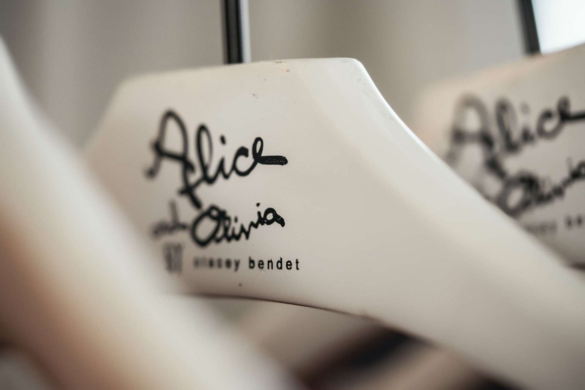Hanger with Alice & Olivia logo: Alice & Olivia New Collection Event | Private Corporate Events | Relity Group