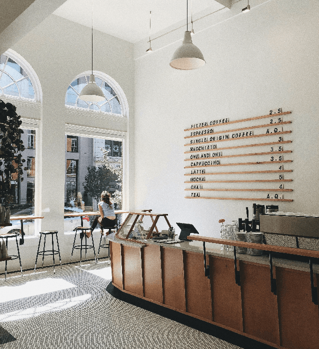 modern coffee shop interior with curved counter