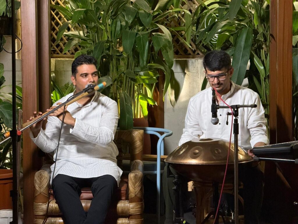 Handpan and flute musicians performing live ambient music at Santé Spa Cuisine Pune