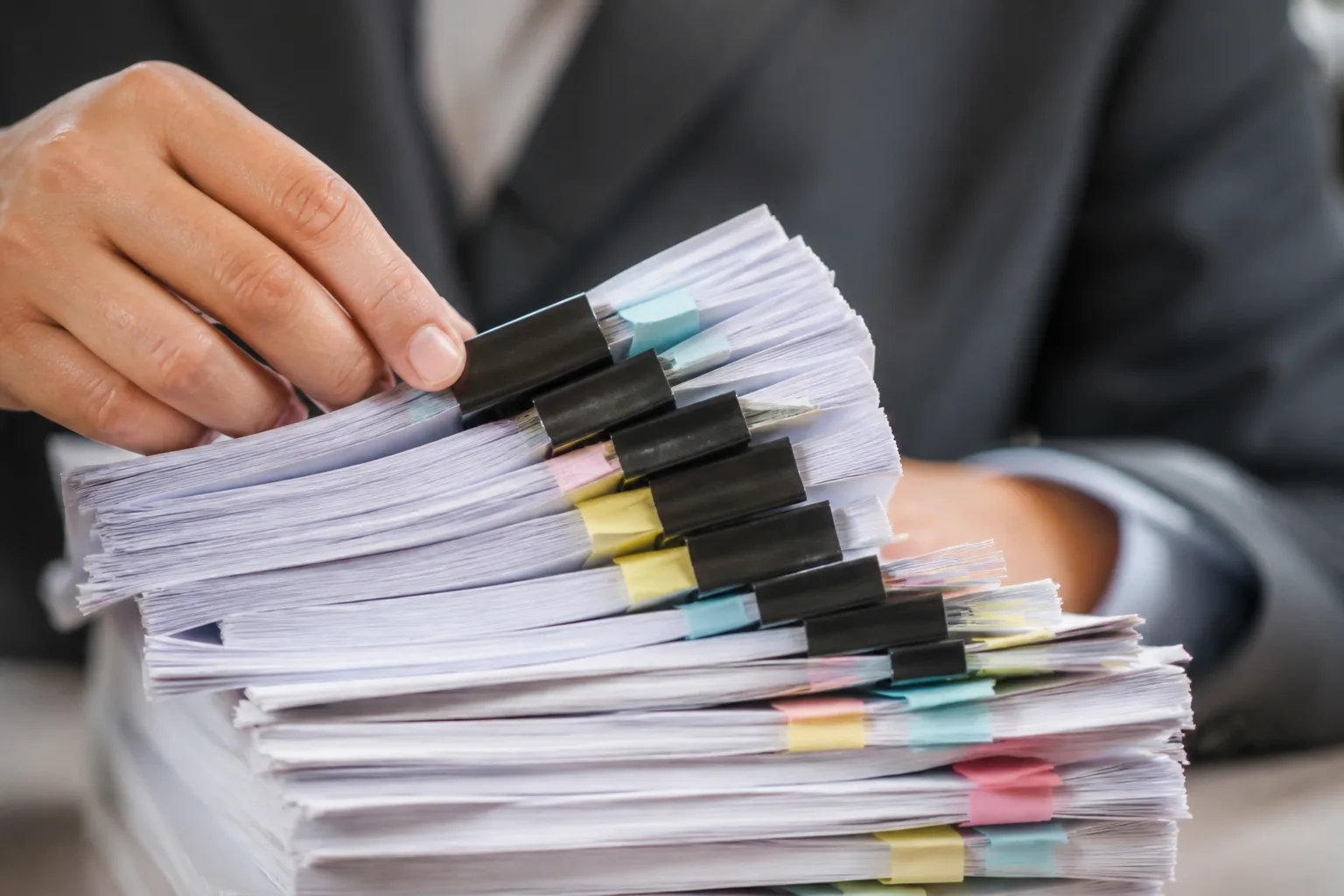 Record Keeping Rules for UAE Businesses beside a Dubai trade license document and a modern