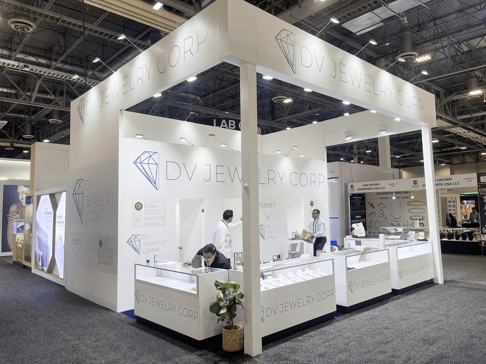 DV Jewelry JCK 2023 20x20 booth at The Venetian Expo Las Vegas – showcase counter setup and leveling for diamond and lab-grown jewelry display lines
