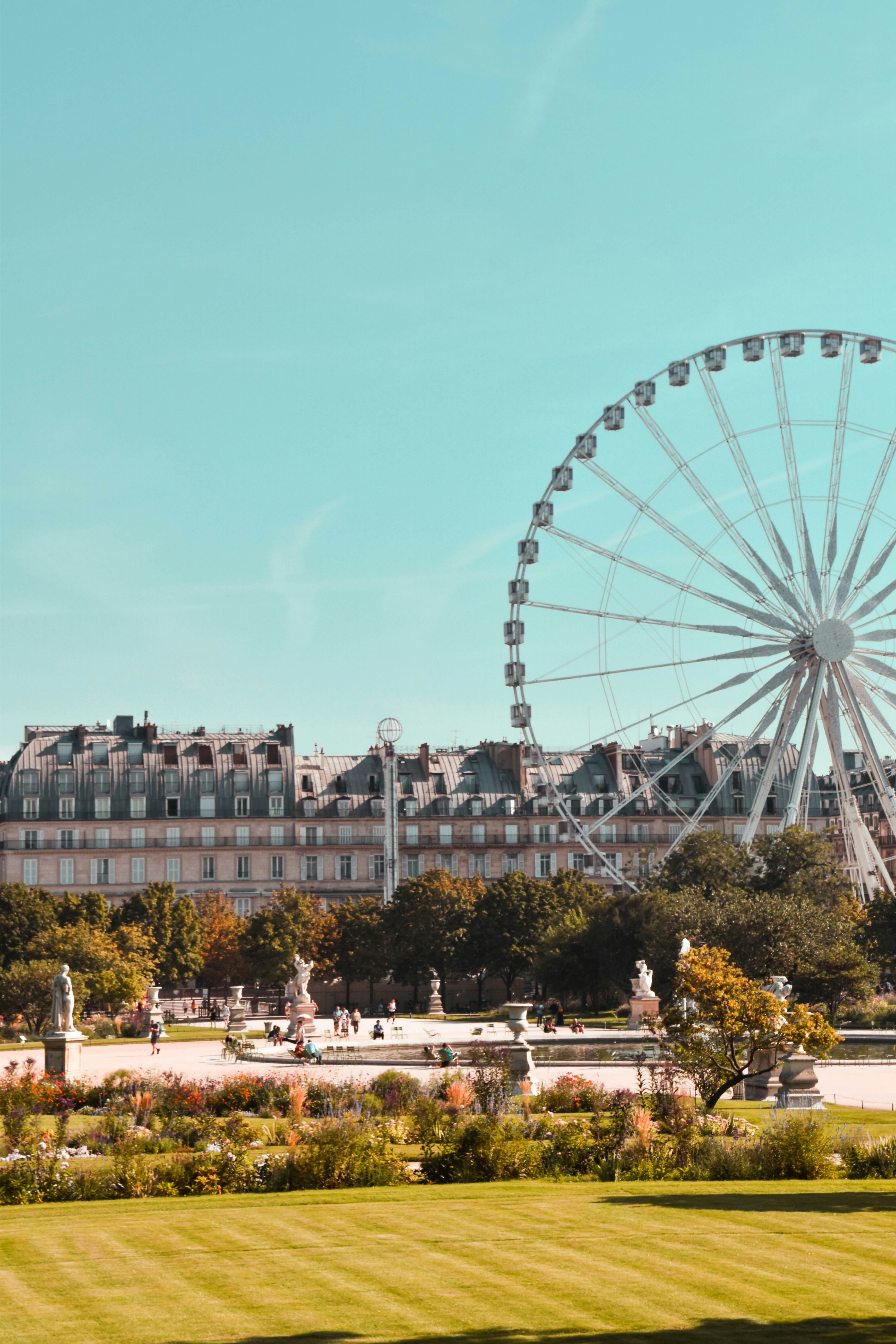 Ferris Wheel under blue skyu