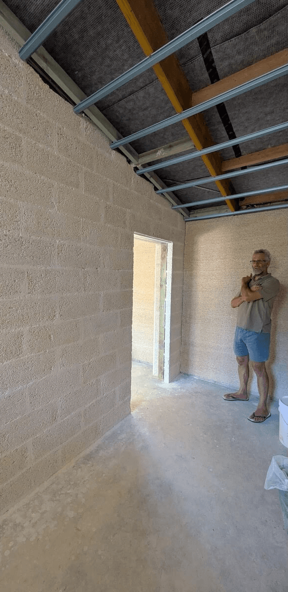A review of a customer looking at a hemp block wall in their beautiful new hemp house