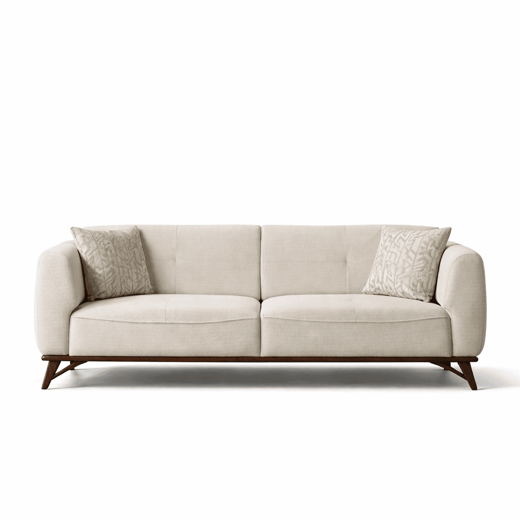 Light-toned upholstered seating with softly rounded arms and angled wooden cross-legs
