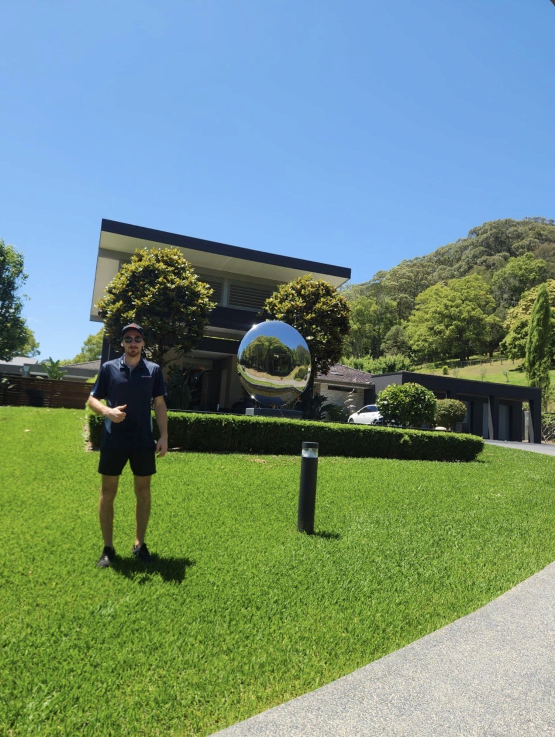 Licensed Pest techncian standing in front of property, Central Coast NSW