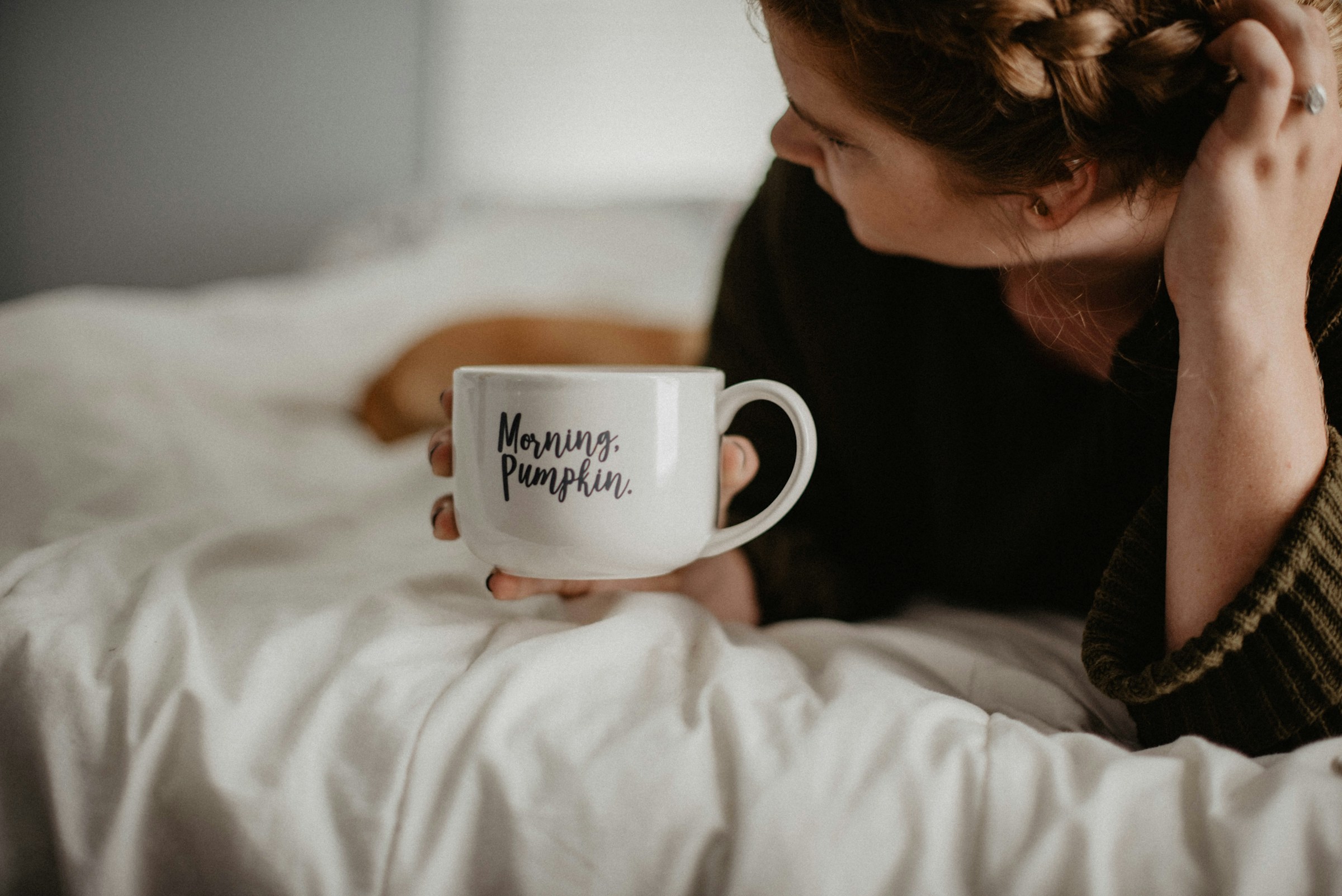 woman with coffee - Morning Routine Checklist