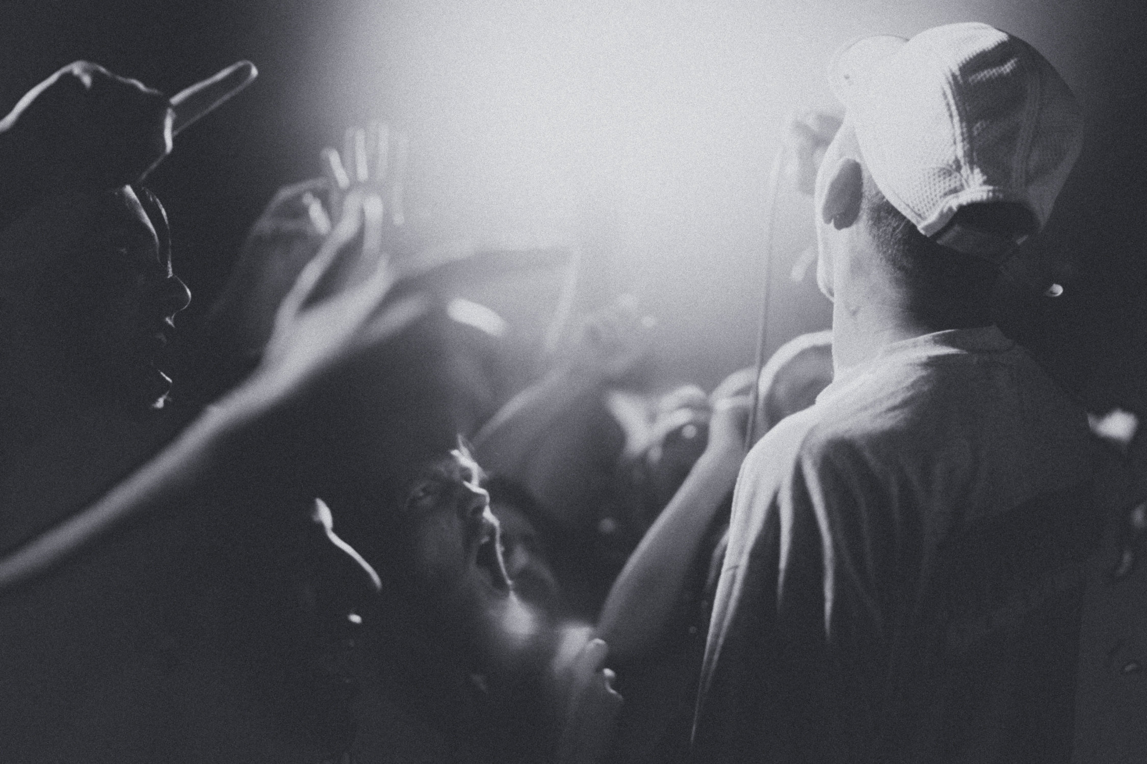 A man singing to a crowd