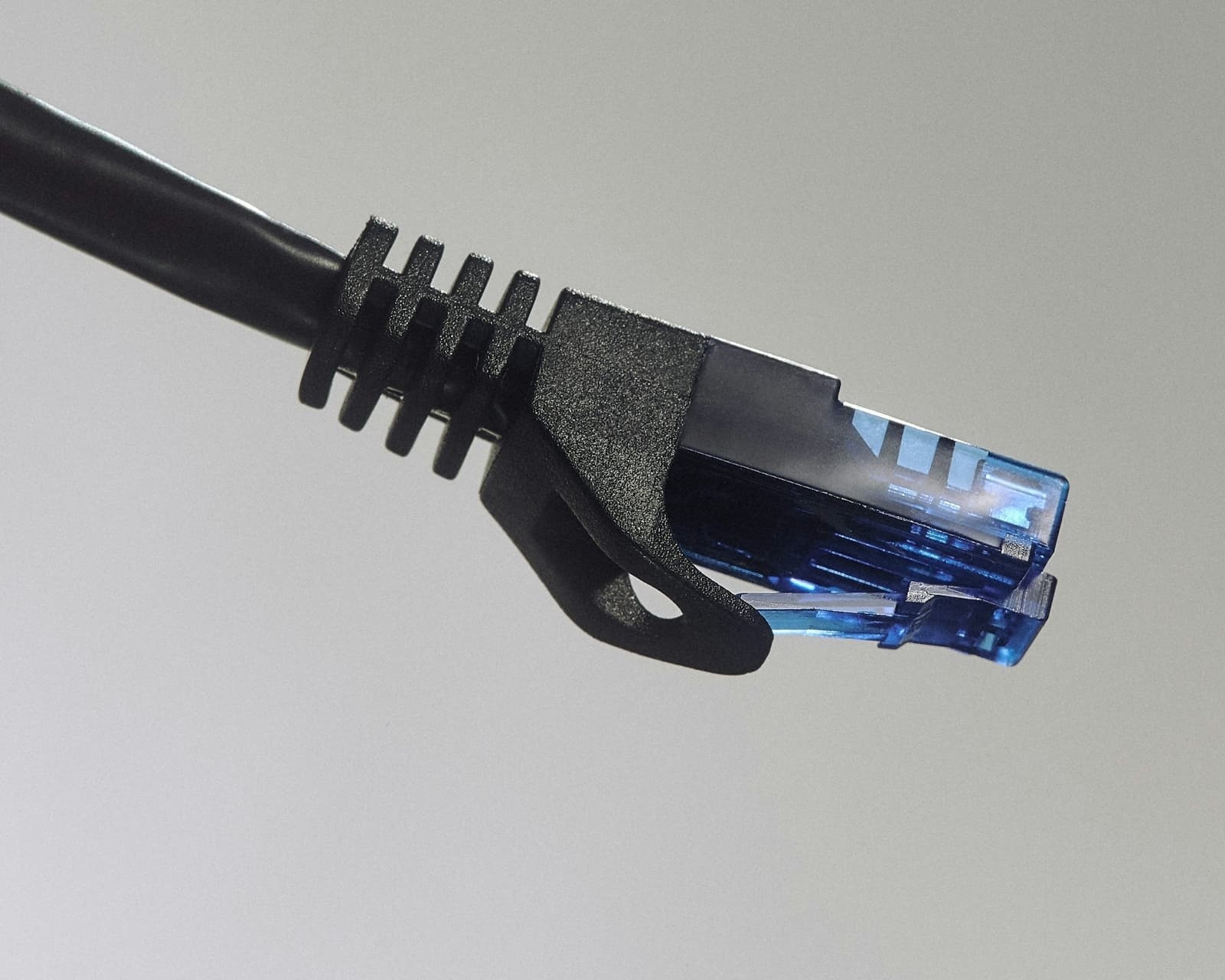 Internet ethercable over a gray background