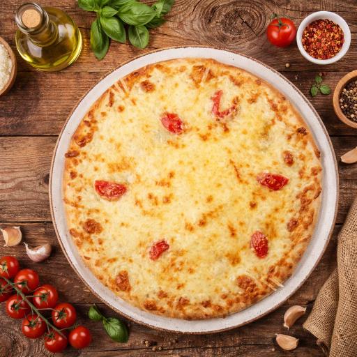 pizza with green leaf vegetable