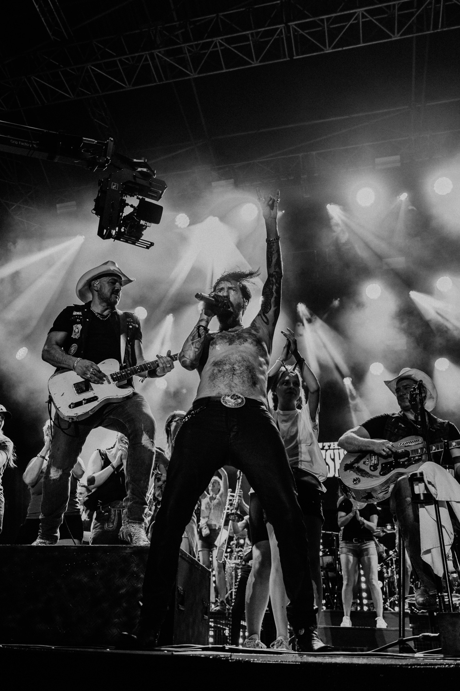 Friends laughing and posing inside a car