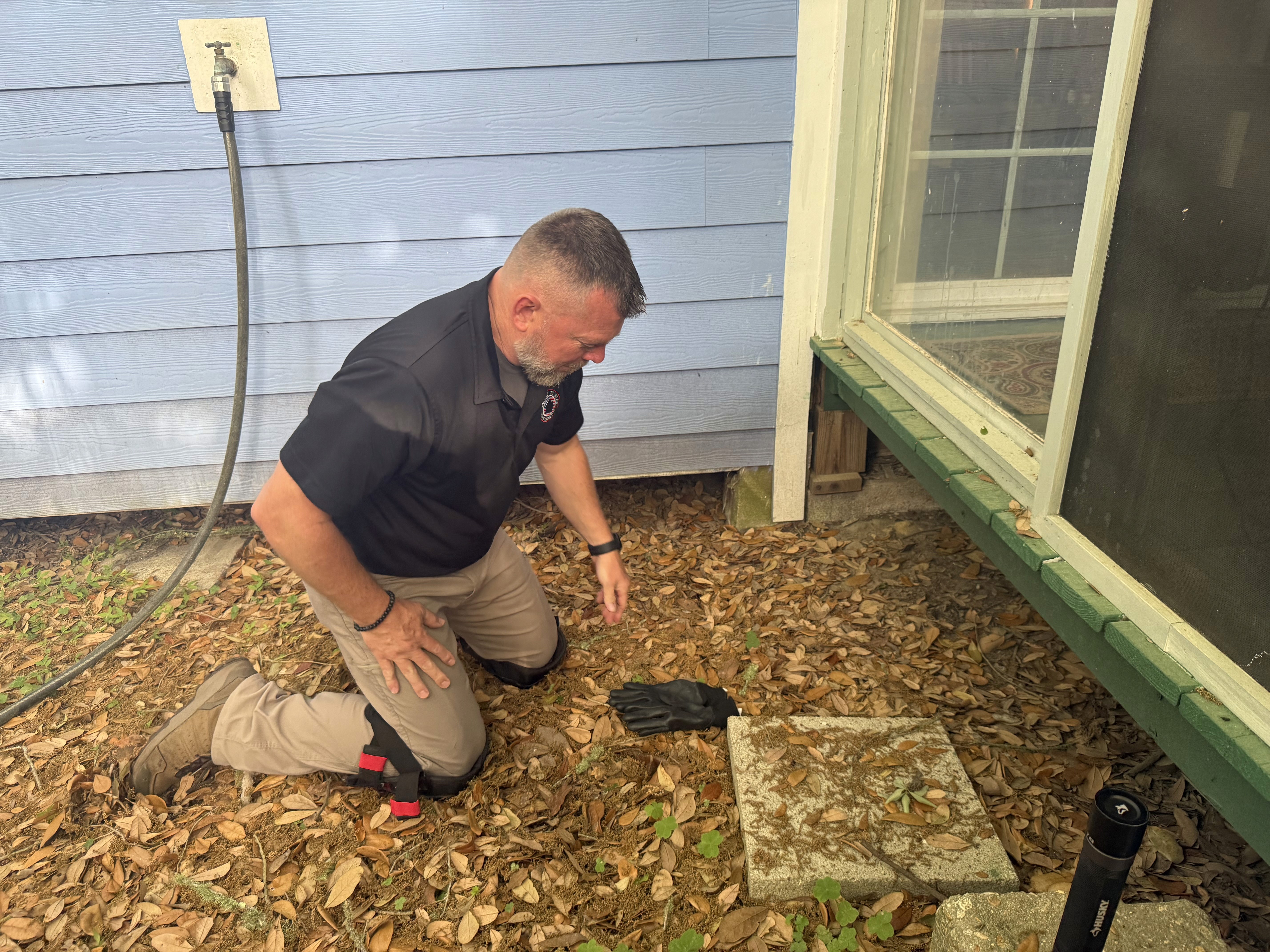 home inspector inspecting house in Ocean Springs Mississippi