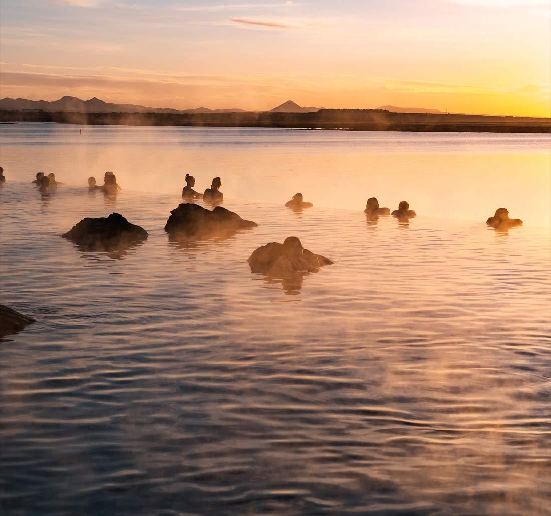 Sky Lagoon near Reykjavík with infinity-edge geothermal pool and ocean view at sunset