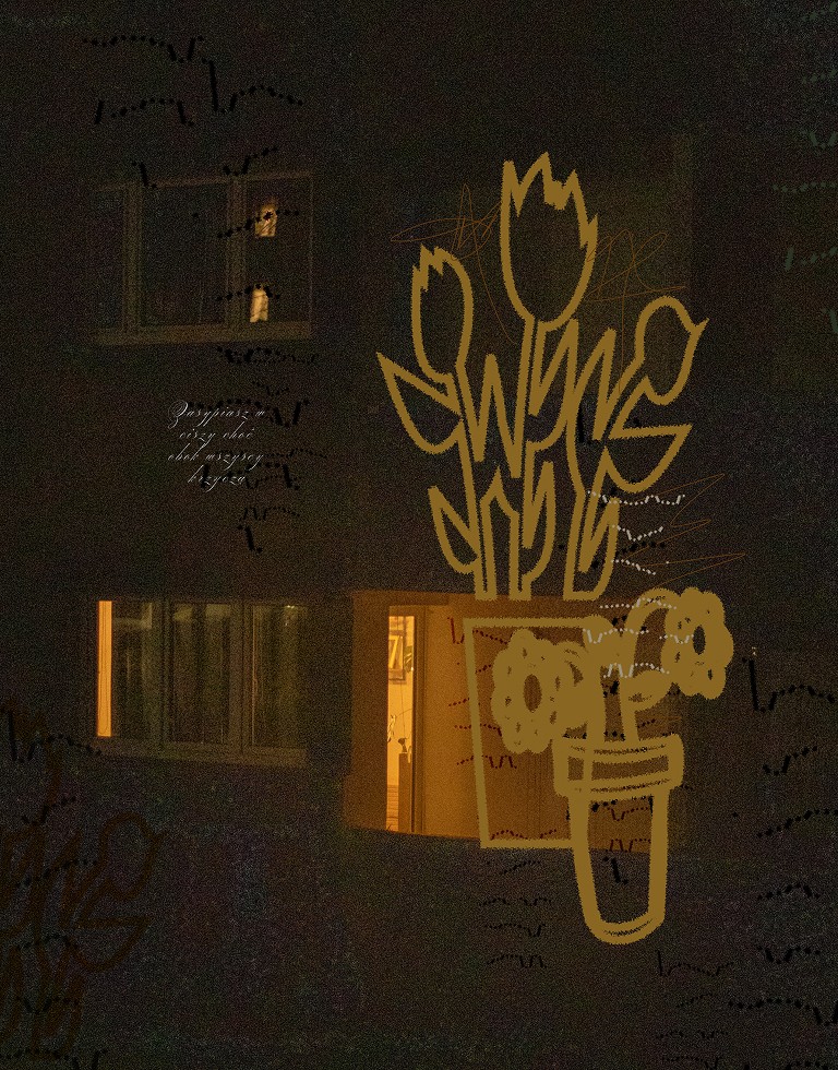 A close-up of a hand wearing multiple decorative rings against a blue background.