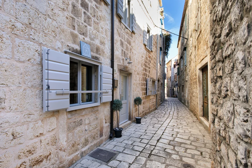Hidden House facade in old town of Stari Grad leading to Hidden House boutique accommodation, Hvar island Croatia