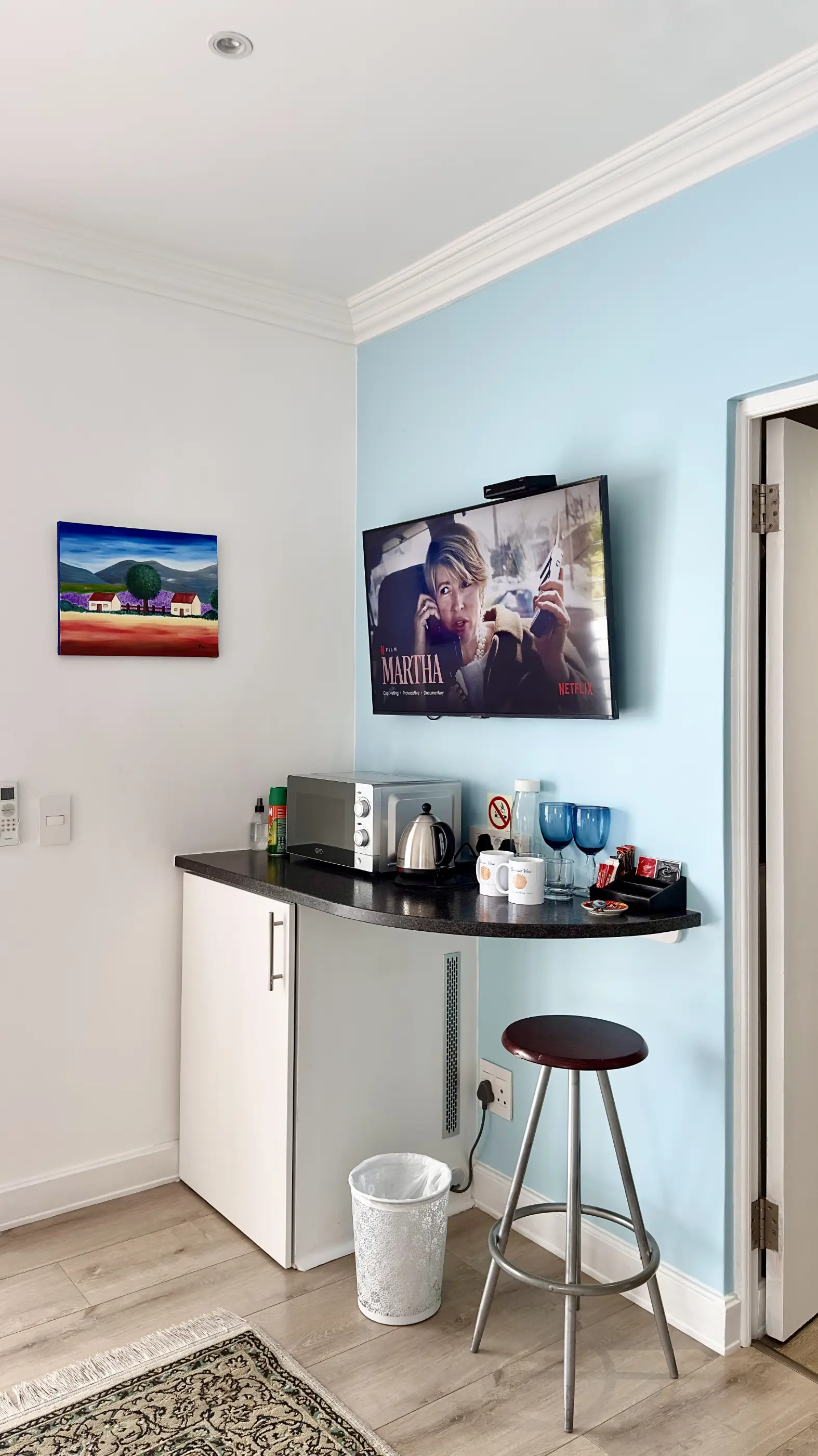 Image of the smart TV, honesty bar and tea areai n our A View 2 Sea room at Somerset View Guest House
