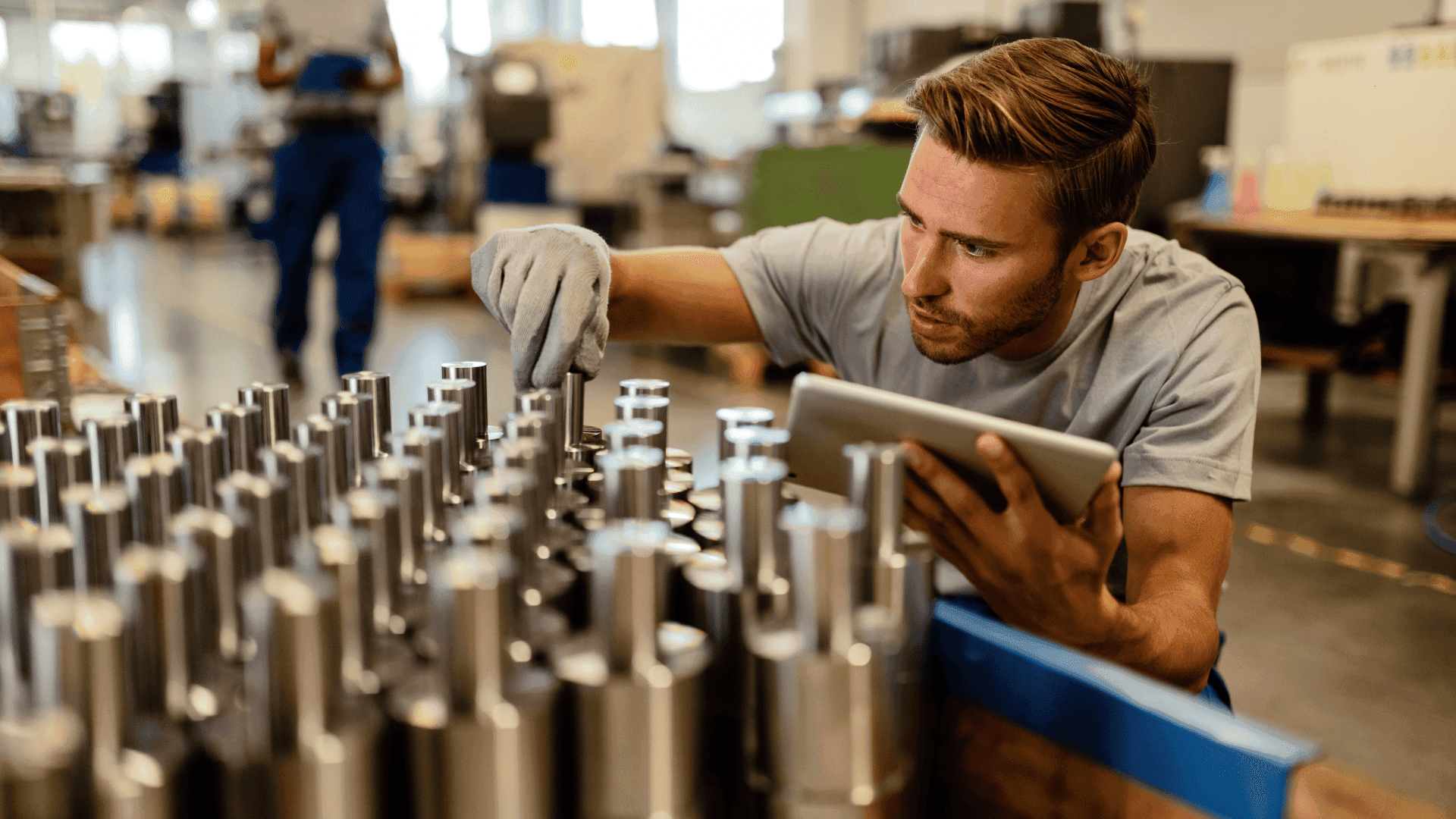 worker doing product defect detection in manufacturing