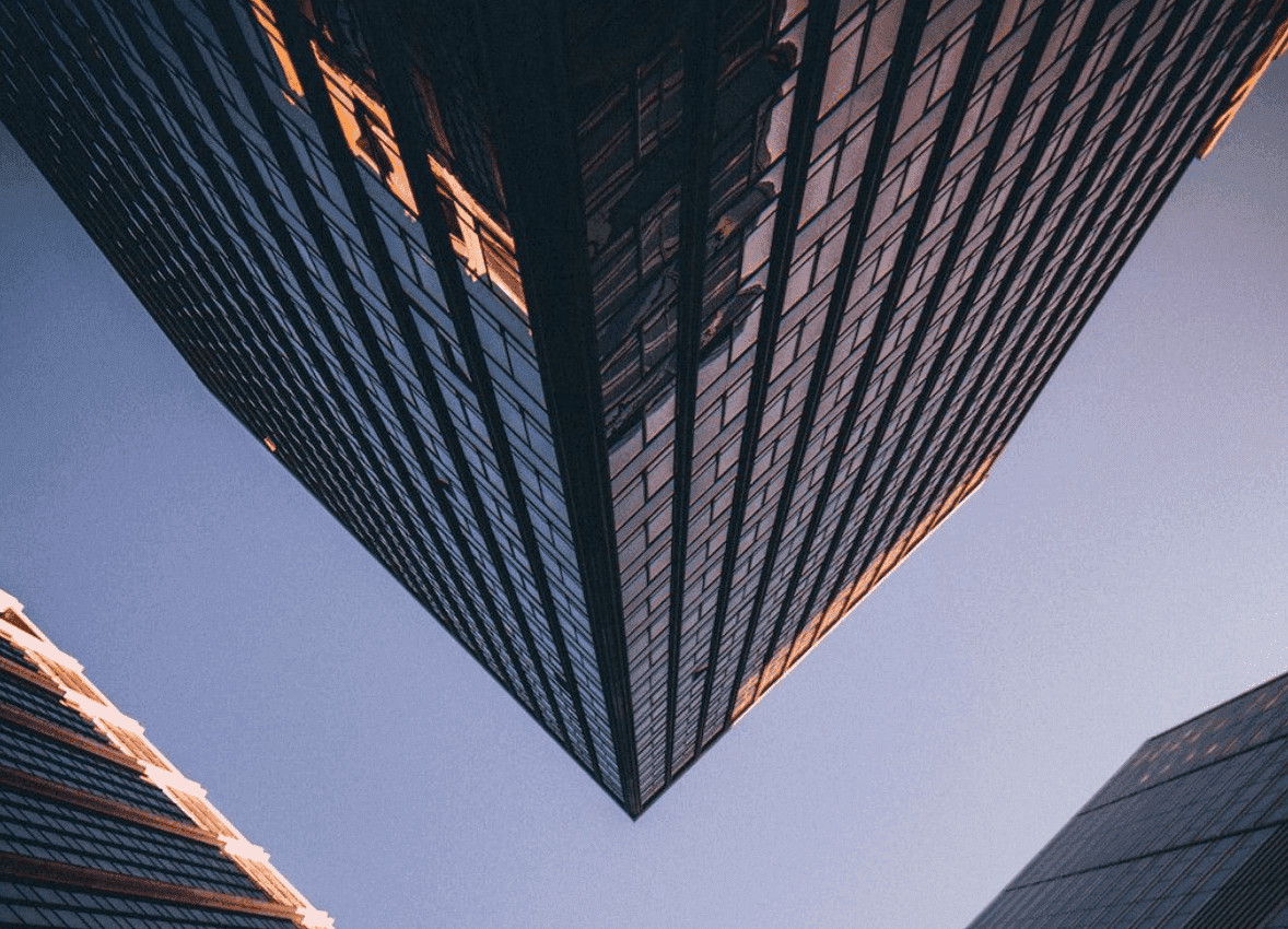 Reflections on skyscraper windows against clear sky