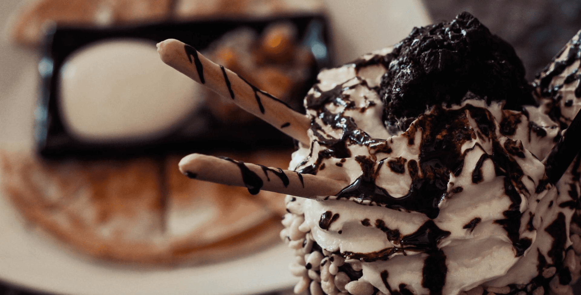 vanilla ice cream with chocolate topping