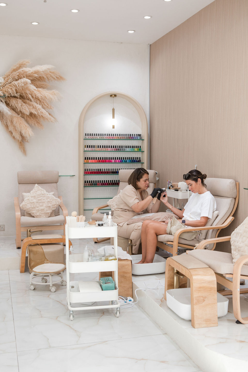 Modern nail and pedicure service at Havie & Moon salon Dubai Hills with elegant interior design.