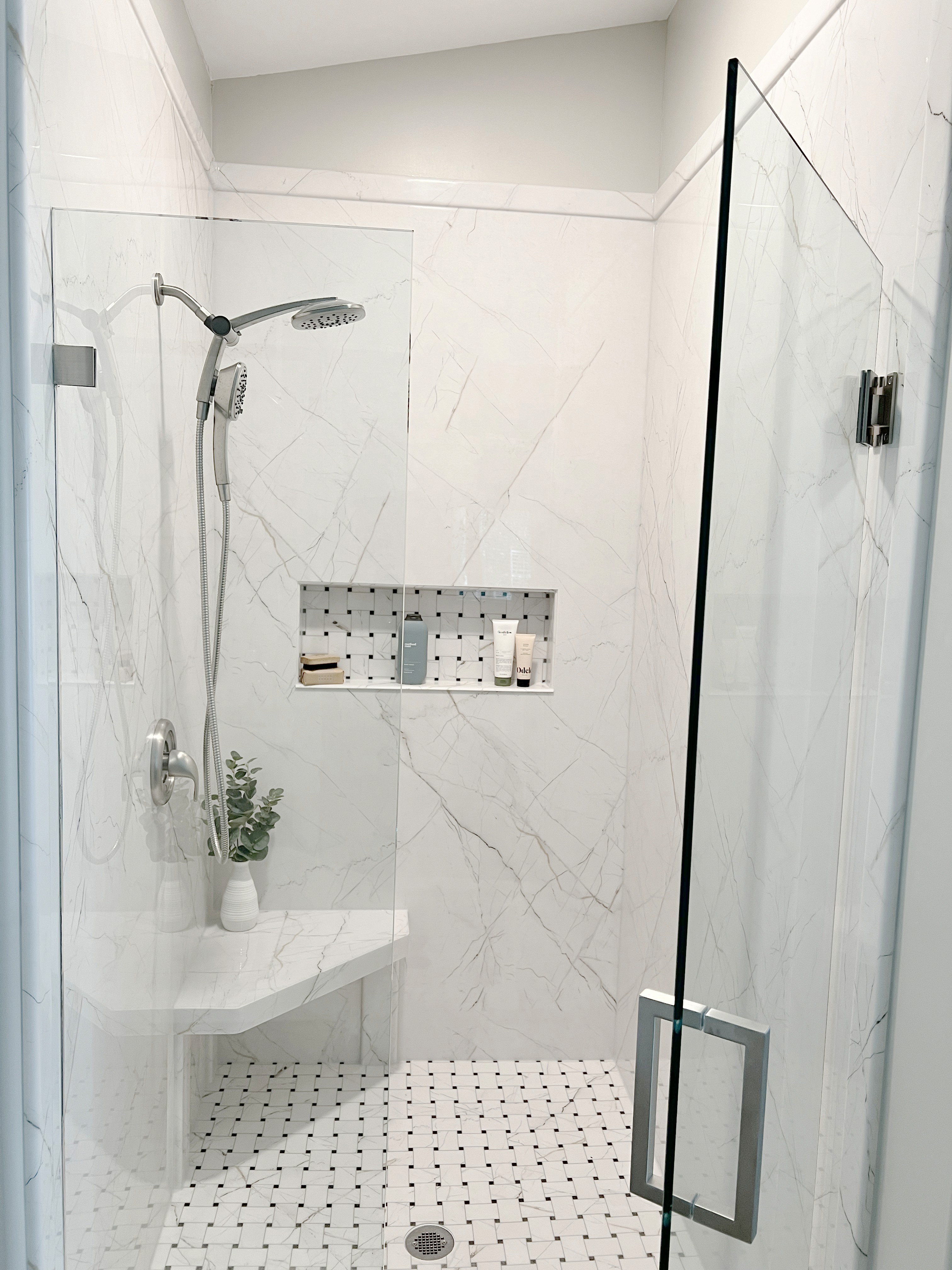 eco-friendly walk-in stone shower with seat