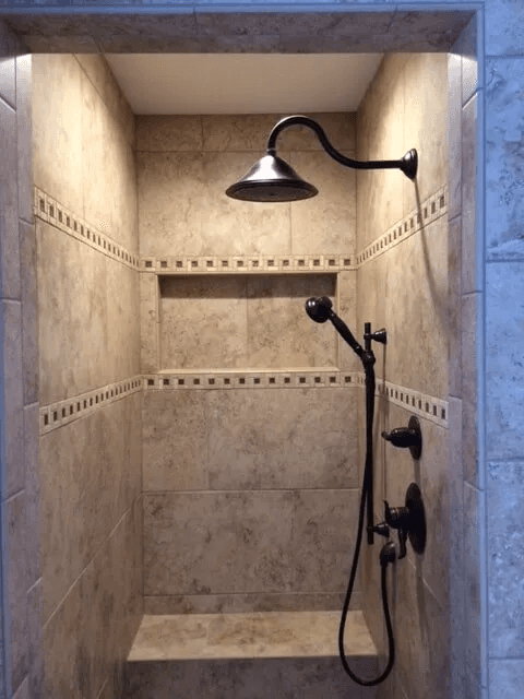 Elegant shower tile installation by Shilling's Carpets & Floors