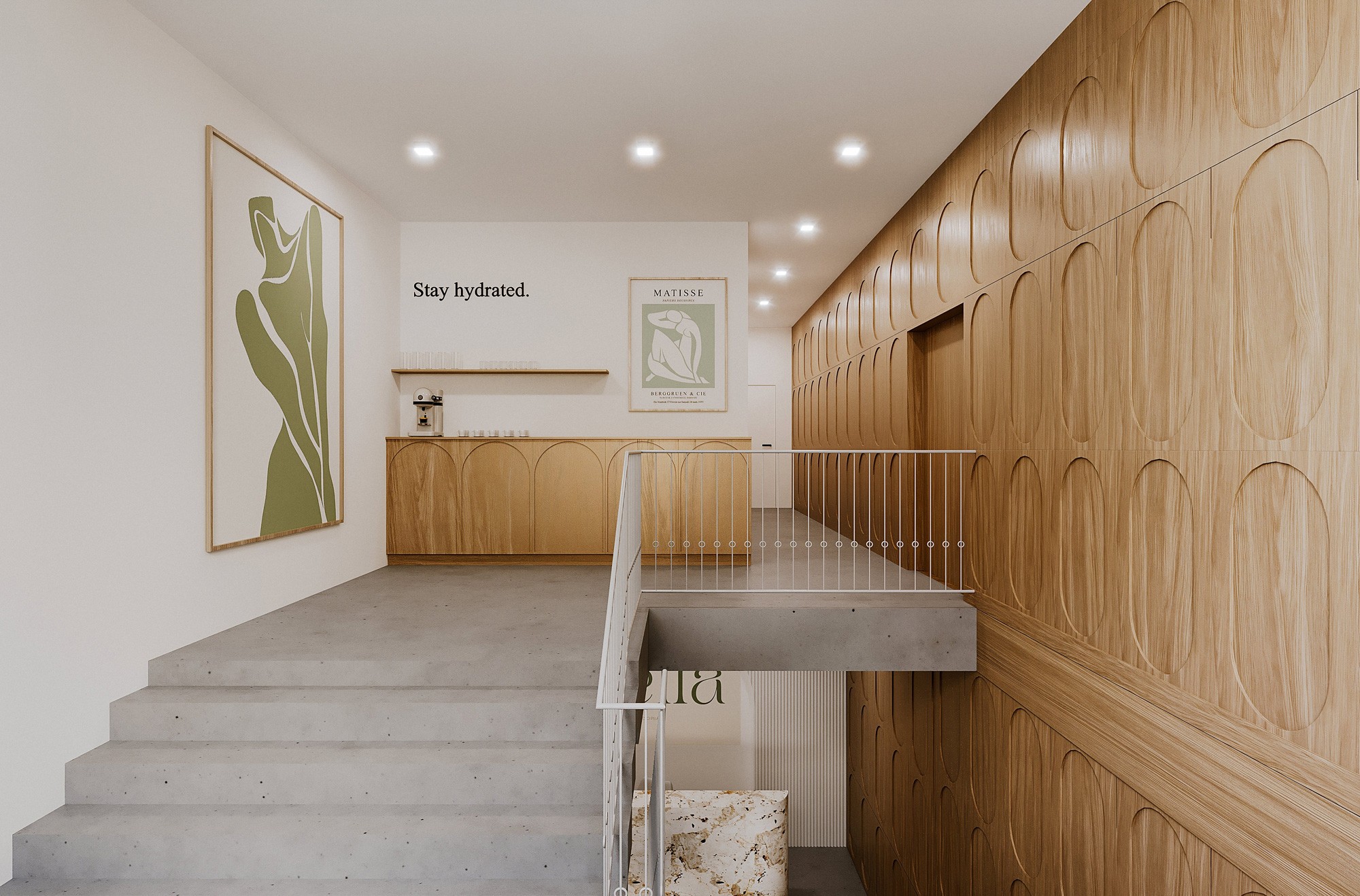 A modern interior featuring light wood paneling, stairs, and neutral decor, creating a spacious ambiance.