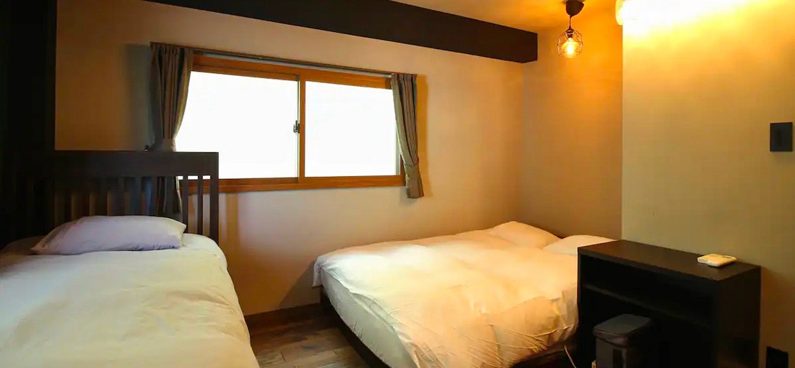 alternate view of the bedroom with two single beds