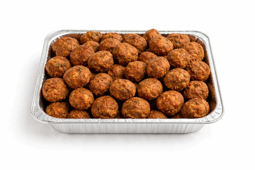 a glass bowl filled with rice on top of a white table