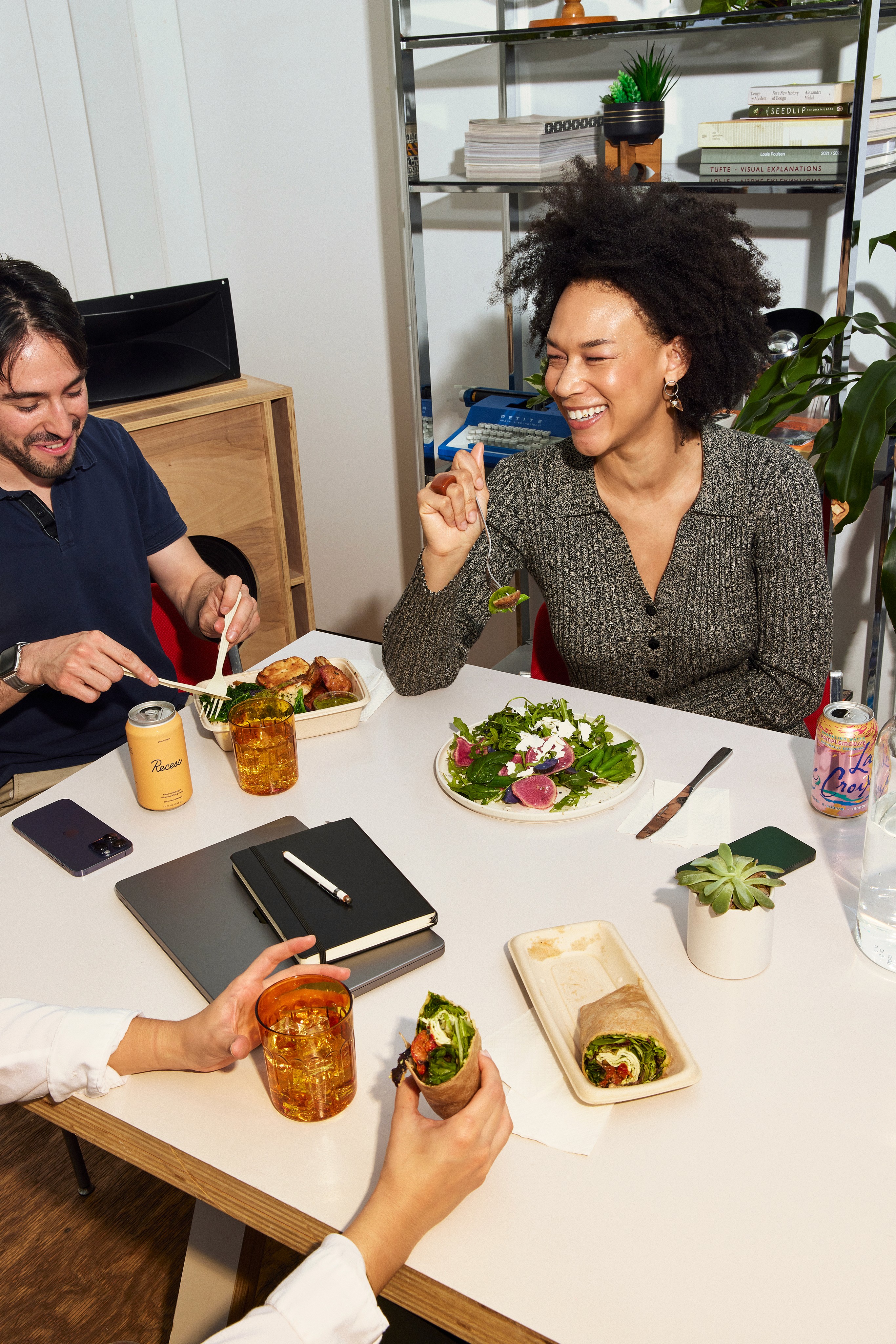 Streetside billboard with flyposters of the Batch.Works brand and illustrations