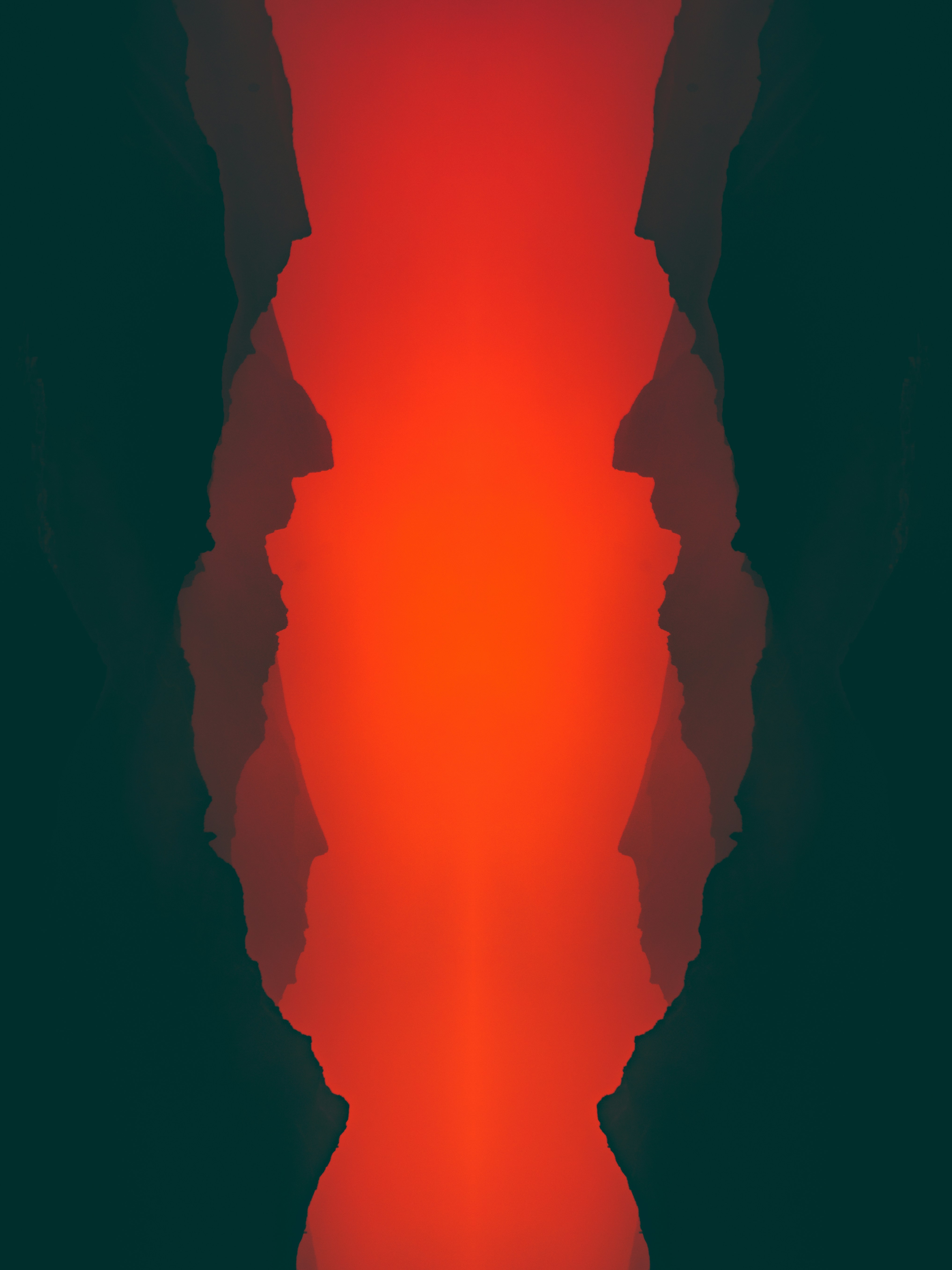 a black and red photo with a red background