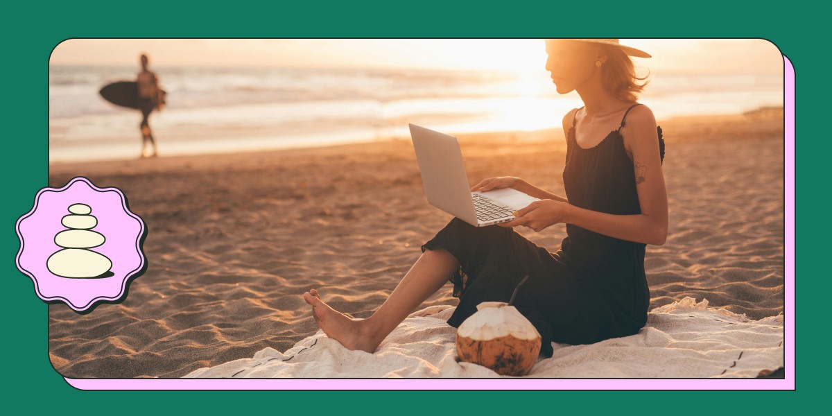 Nurse sitting on a beach with a laptop, symbolizing mental health and work-life balance for nurses.