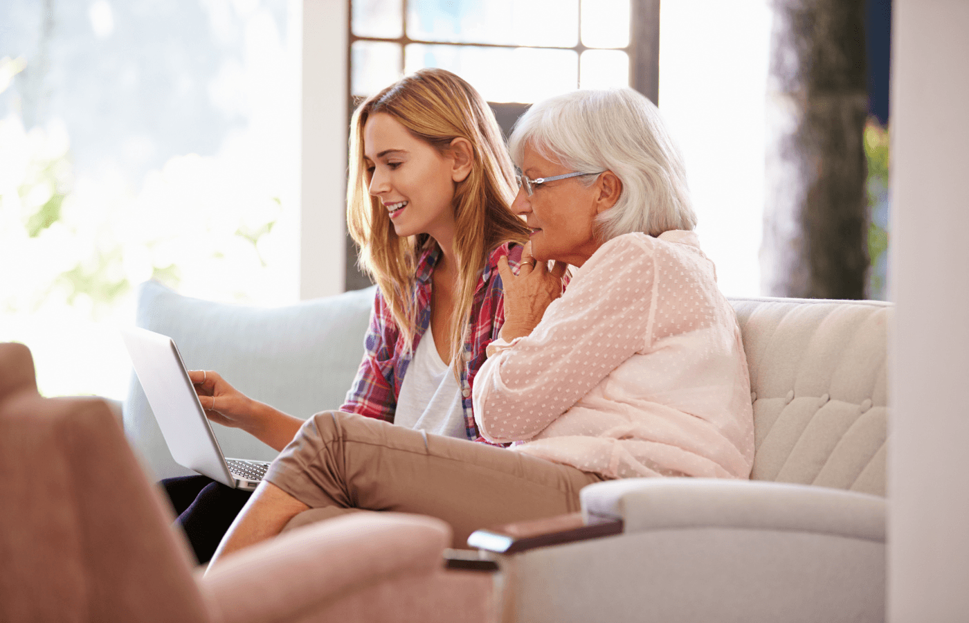 Daughter Helping Grandmother with Computer