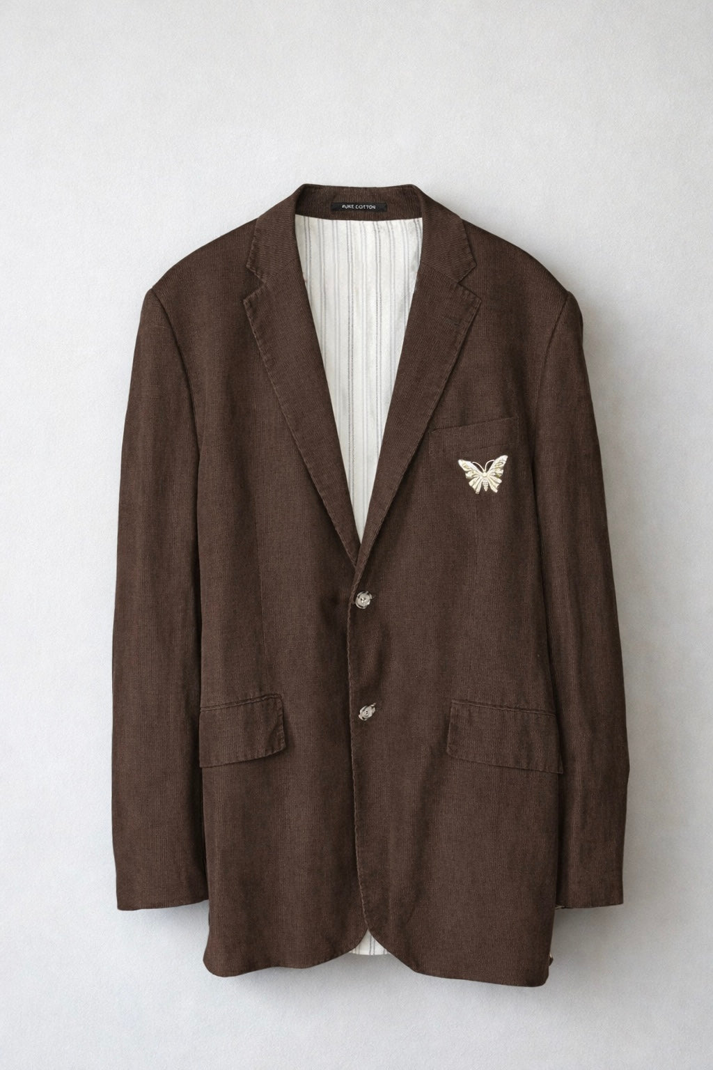 Brown blazer with butterfly design on pocket