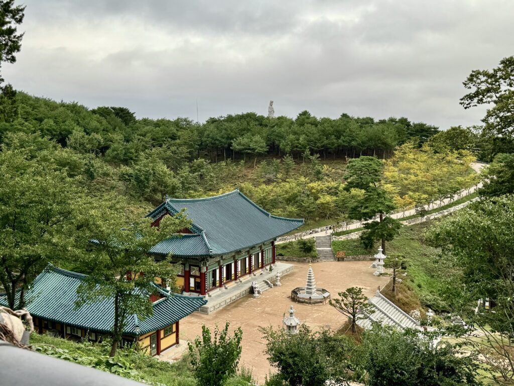 A panoramic view of the wontongbojeon, pagoda and the sea goddess Guanyin.