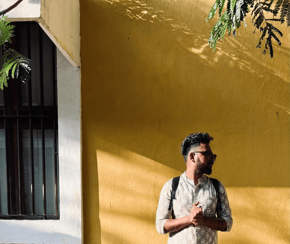 Extreme close-up of a Black person looking directly at the camera, face filling frame.
