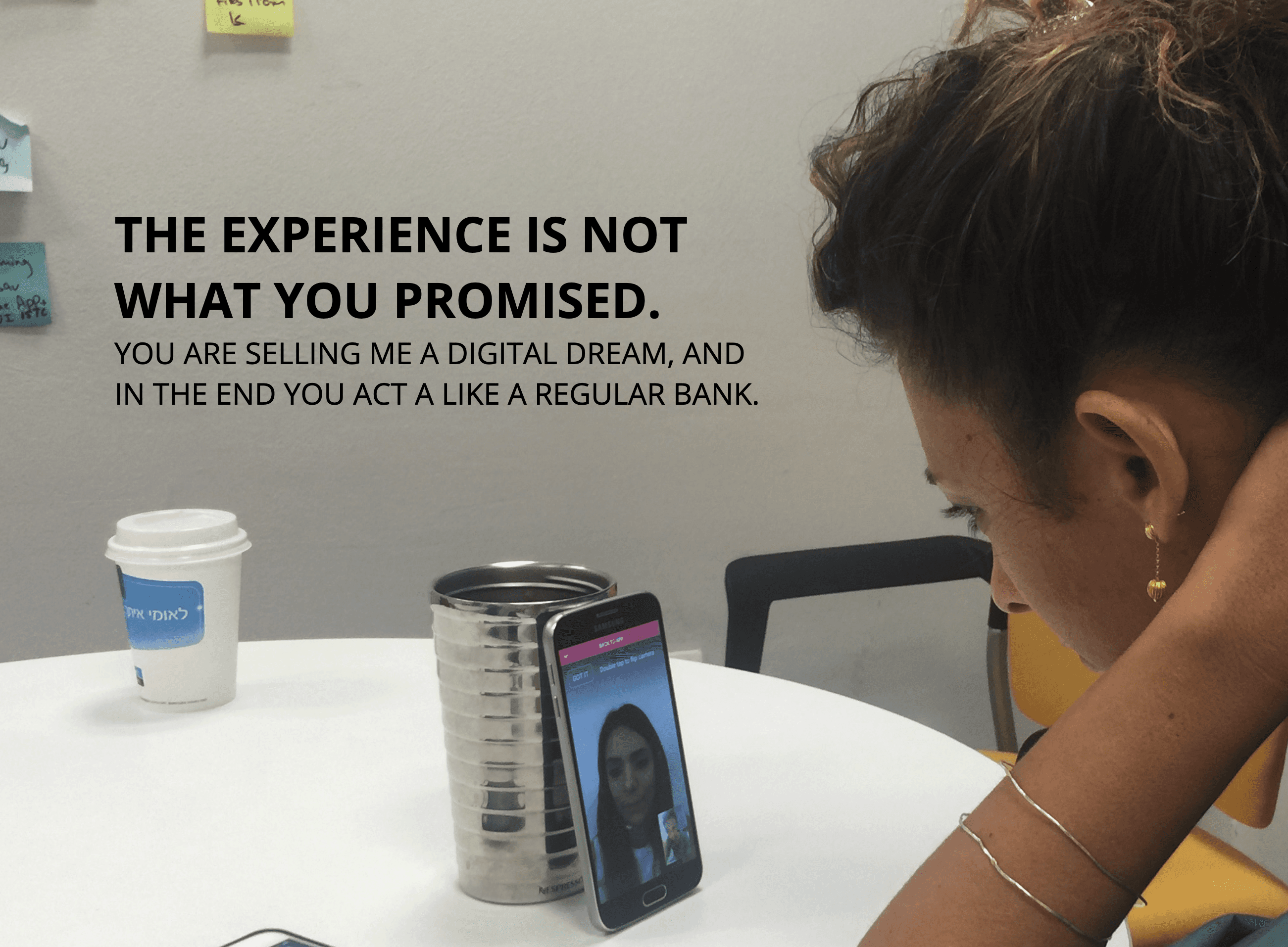 A screen showing a customer talking to an agent in a video call and a label: The experience is not what you promised, you are selling me a digital dream and in the end you act like a regular bank.