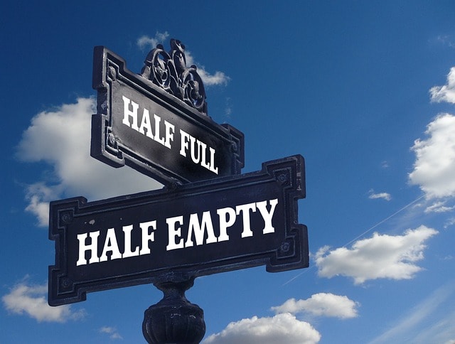 Street sign with the words 'half full' and 'half empty'