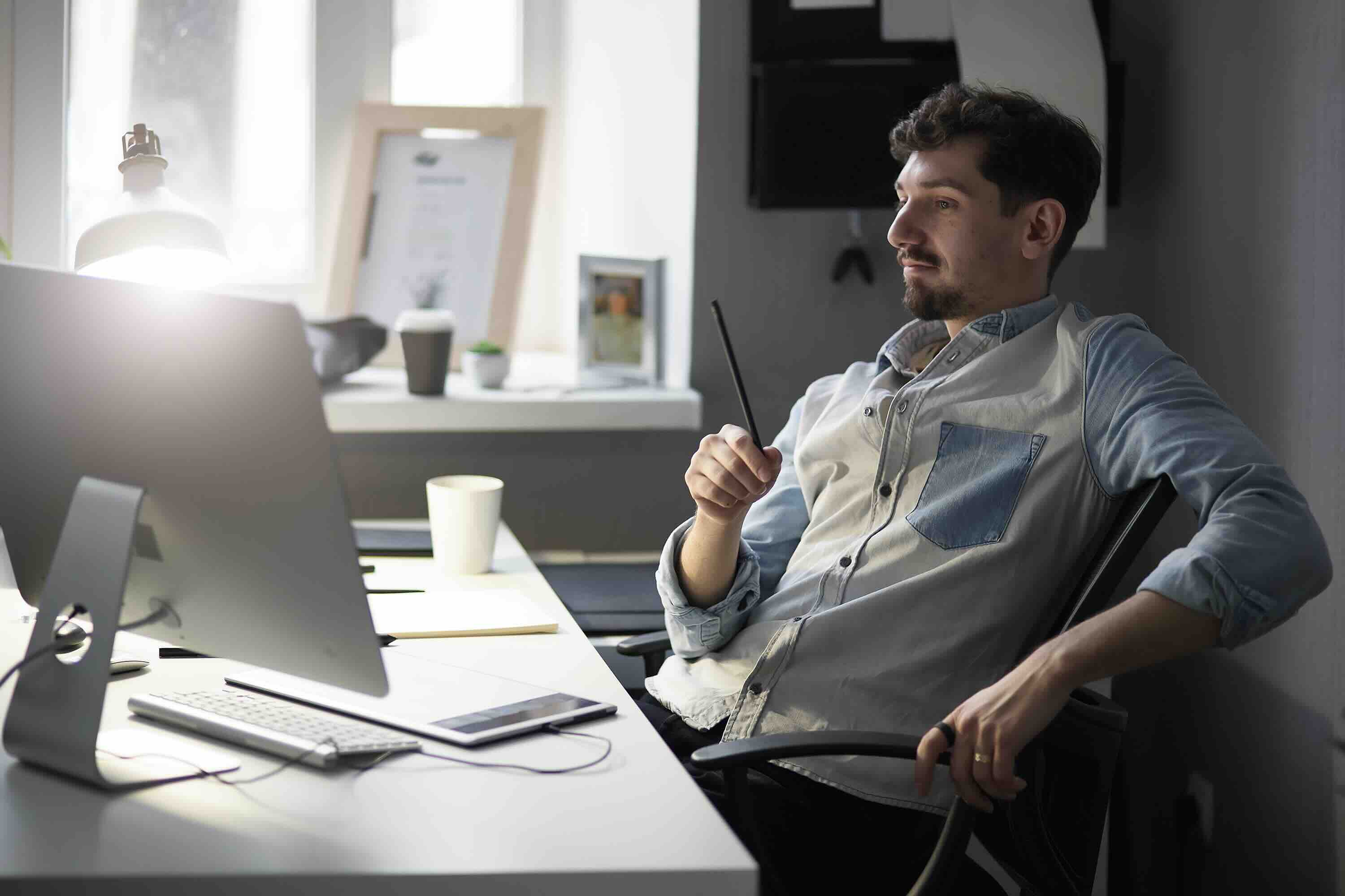 man at an office desk