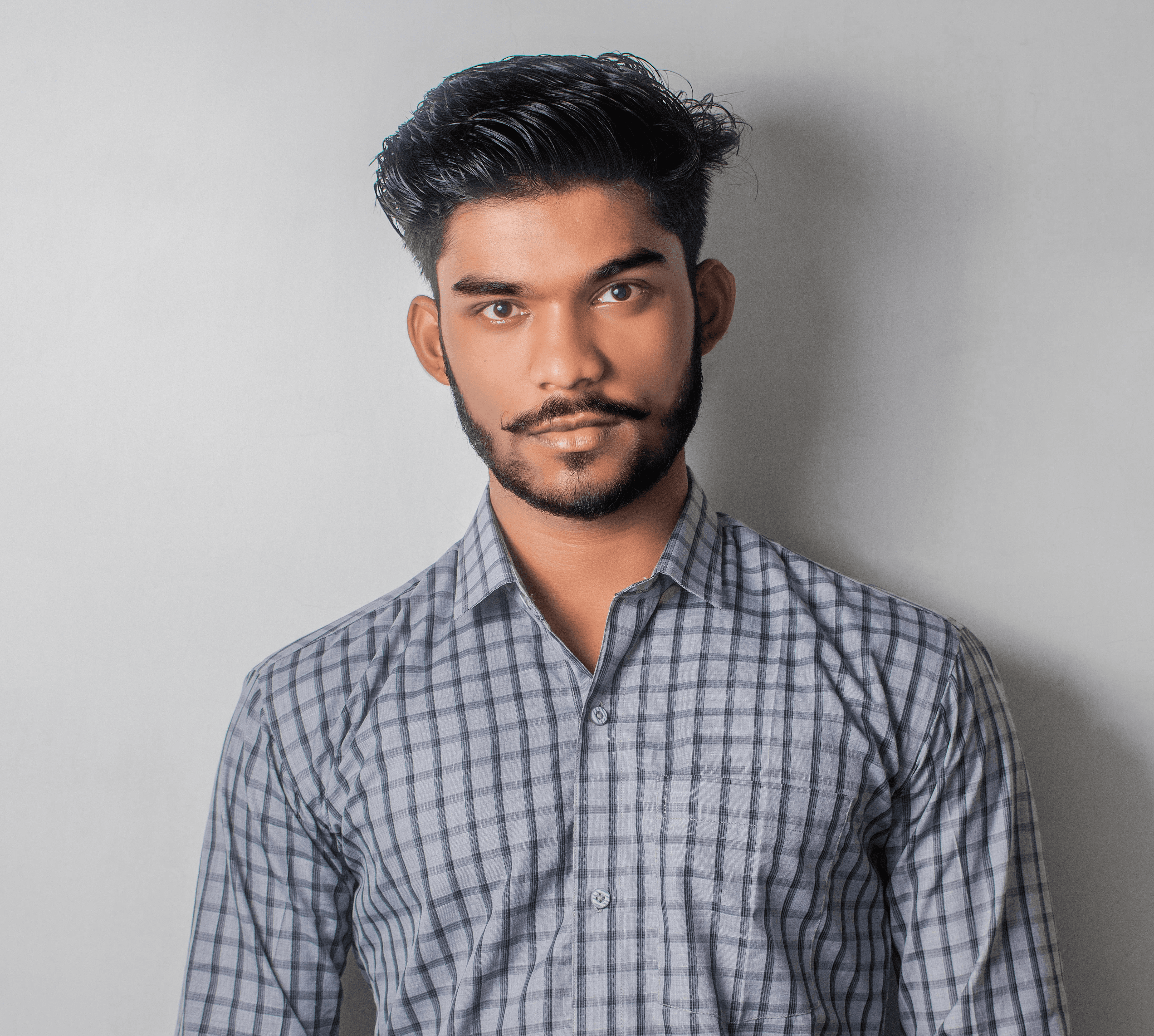 man in gray and black checkered sport shirt and black pants outfit