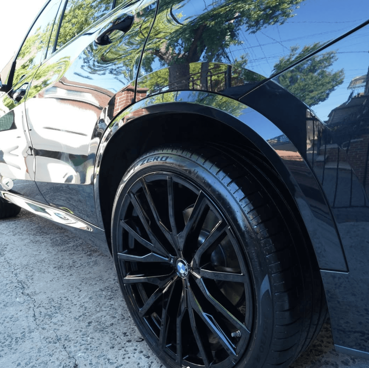 Hydrophobic water beading on ceramic coated car hood NYC